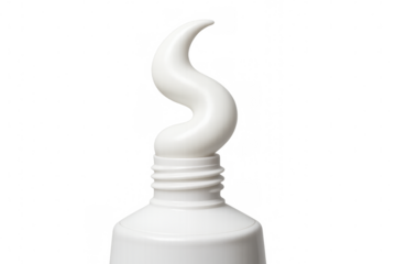 White toothpaste or cream emerging from a tube, clean beauty and skincare product concept, transparent background