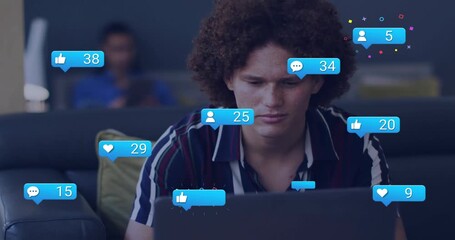 Man tapping laptop while comment bubble popping, media icons rising boosting marketing engagement - Powered by Adobe
