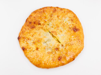 Golden Baked Georgian Kubdari With Flaky Crust And Meat Filling On White Plate