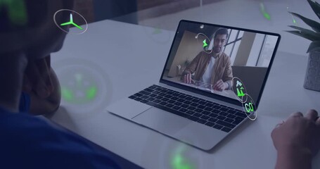 woman raising hand, initiating eco icons swirling around laptop while man on screen presenting tech - Powered by Adobe