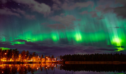 Aurora Lights Over Calm Water Finland
