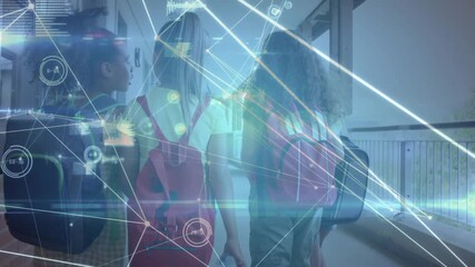School girls walking in corridor and noticing data overlay before reaching door to enter classroom - Powered by Adobe