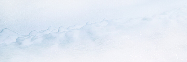 Copy space. Snow surface winter background. Natural pattern winter. Horizontal format.