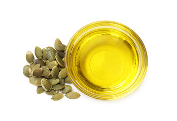 Pumpkin seeds and oil isolated on white, top view
