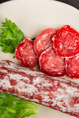 Dry sausage slice pork less fat jamon cured meat natural product tasty snack fresh delicious gourmet food background on the table rustic top view copy space