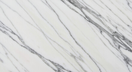 White marble surface with natural grey veining pattern forming elegant and smooth polished texture