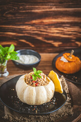 Stuffed mini pumpkin with couscous filling