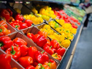  Boxes with colorful peppers on the market.