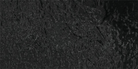 Dark, textured abstract background with a rough, uneven surface resembling cracked earth or distressed metal in grayscale for industrial or grunge themes