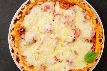Pizza ham, cheese, tomato sauce fast food natural product tasty snack fresh delicious gourmet food background on the table rustic top view copy space