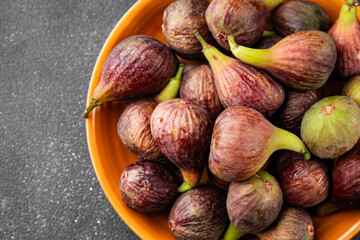 Figs fresh ripe fruit natural product tasty snack fresh delicious gourmet food background on the table rustic top view copy space diet vegan and vegan food