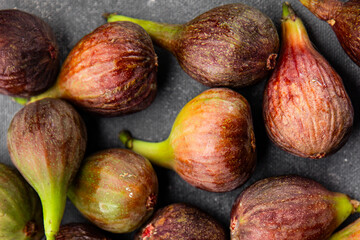 Figs fresh ripe fruit natural product tasty snack fresh delicious gourmet food background on the table rustic top view copy space diet vegan and vegan food