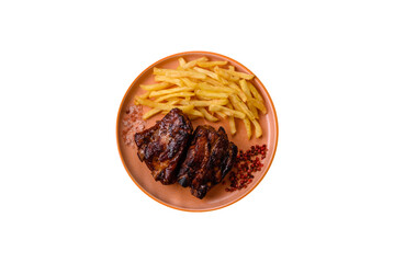 Grilled or barbecued pork ribs with sauce. Grilled ribs