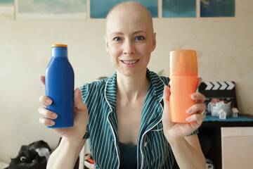 Cancer survivor comparing SPF products for sensitive skin, symbol of awareness, healthy lifestyle,...