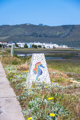 Mosaic roadside boundary depicting a seahorse © Daniela Baumann