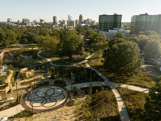Aerial view of Gipson Play Plaza playground and downtown Raleigh NC skyline in the distance