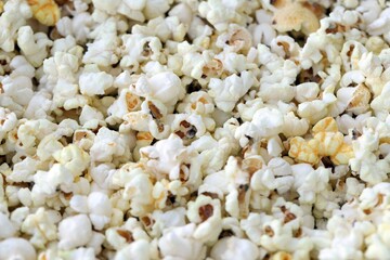 Popcorn texture background. Big amount of popcorn as pattern photo