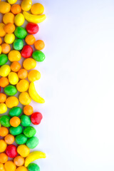colorful fruit candy background with vertical copy space