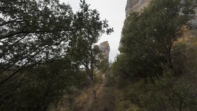 First person view hiking on mountain trail in orgon, france