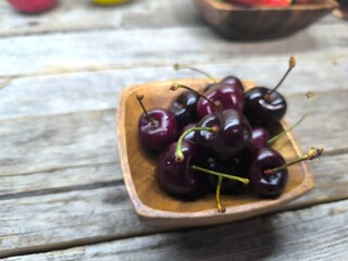 cherries on a wooden table
