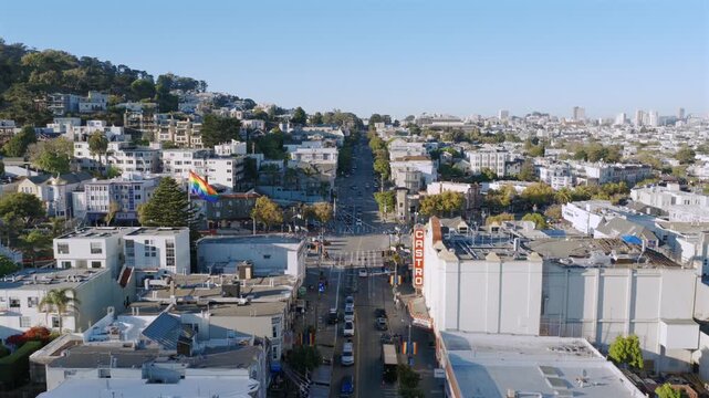 San Francisco - Low Aerial Approach Over Castro District with Pride Flag on Sunny Day 