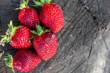 strawberries on a wooden board