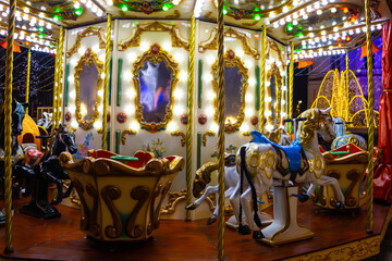 Retro carousel at the Christmas Market. Horse carousel at the Christmas Market  © Oana