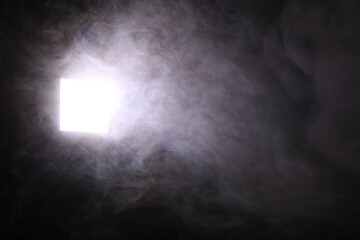 Professional lighting equipment without reflector and smoke on dark background