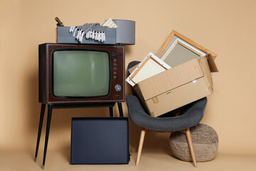 Garage sale. Different used stuff on beige background