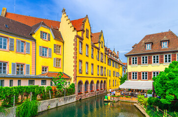 Little Venice la Petite Venise in old town Colmar city historic centre with old colorful houses medieval buildings on bank of river Lauch canal in summer day, Alsace Grand Est region, France