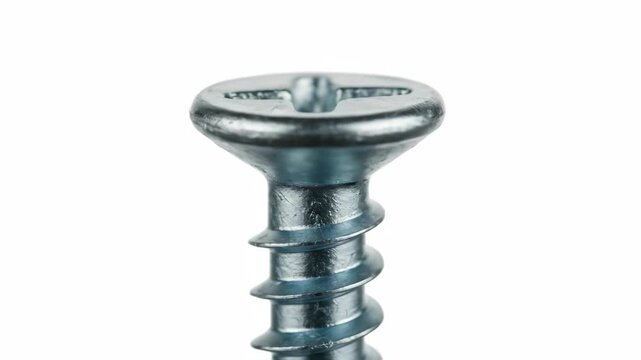 Detailed Metal Screw on White Background - A close-up shot of a metal screw isolated on a white background, showing its detailed threads and head.