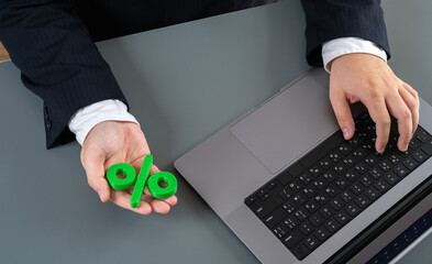 The man issues a loan at a favorable interest rate. Sales margin. Financial transaction, credit policy, and profit management. Topics include lending, investments, and commercial banking operations.