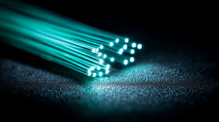 Fiber optic strands transmitting data in parallel, representing high speed connectivity and modern communication infrastructure.
