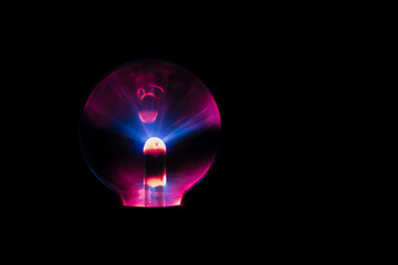Lightning in the middle of a glass ball. Plasma background image