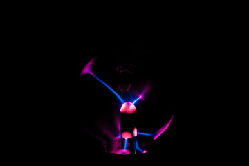 Lightning in the middle of a glass ball. Plasma background image close-up