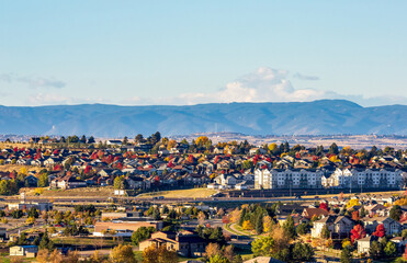 Colorado Living. Centennial, Colorado - Denver Metro Area Residential Autumn Panorama with the view of the Front Range mountains in the distance