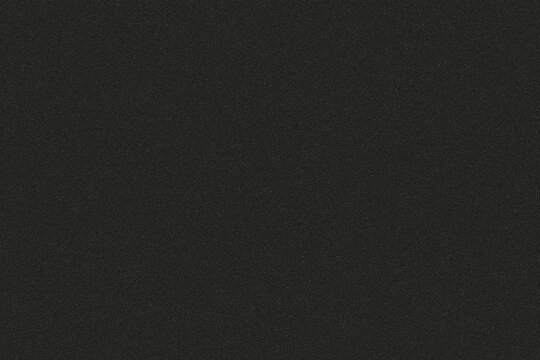 Dark gray textured background with subtle speckles