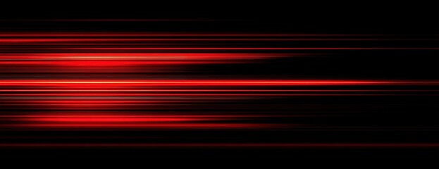 Abstract dynamic red light trails on a black background create motion blur