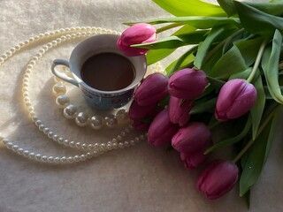 Pink tulips, corals and morning coffee