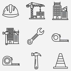 Fototapeta premium A comprehensive icon set for the construction and building industry, featuring simple line art of a crane, helmet, tools, and architectural elements