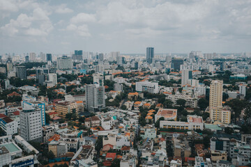 Aerial Panorama of Dense Urban Cityscape under Cloudy Sky in Ho Chi Minh City, Vietnam