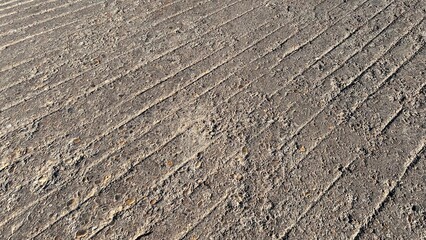 Perspective view of cement floor with diagonal ribs.