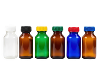 A variety of colorful medicine bottles are isolated on transparent background, showcasing different sizes and cap colors