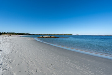 Beautiful white sandy beach at Taylor Head Provincial Park, Nova Scotia, in glorious autumn weather. These beaches are still undiscovered gems.