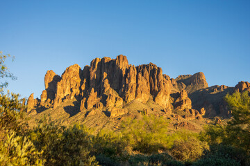Fototapeta premium Sunset Over Superstition Mountains at Lost Dutchman State Park, Arizona Desert Landscape