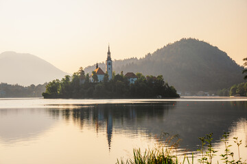 Fototapeta premium Bled, Slovenia. Lake Bled with the Church of the Assumption of Maria and Julian Alps in the background