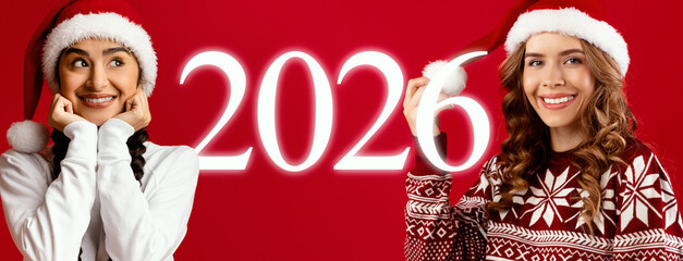 Two individuals with bright smiles are celebrating together against a vibrant red background. They...