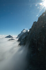 Low clouds among rocky walls