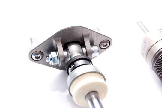 Close-Up of Spherical Bearing Mount on Racing Shock Absorber