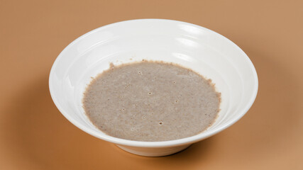Mushrooms soup bowl isolated view